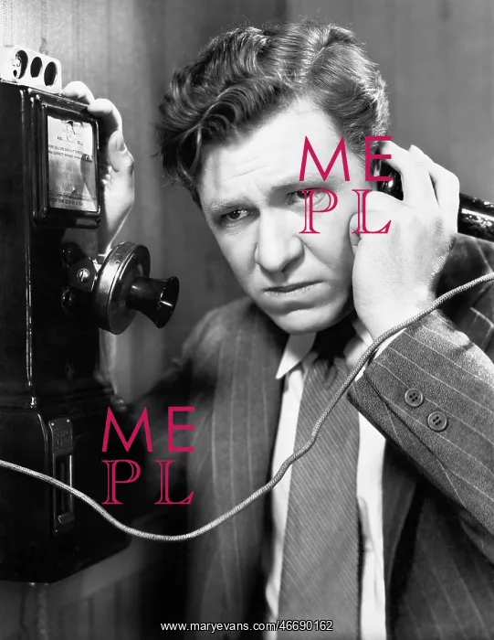 : A man listening on the telephone