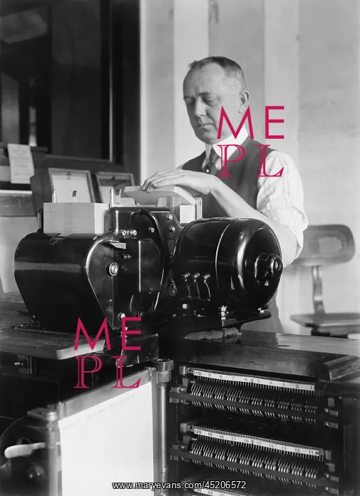 : Man loading punch cards into a tabulating ? : Man loading punch cards into a tabulating ?