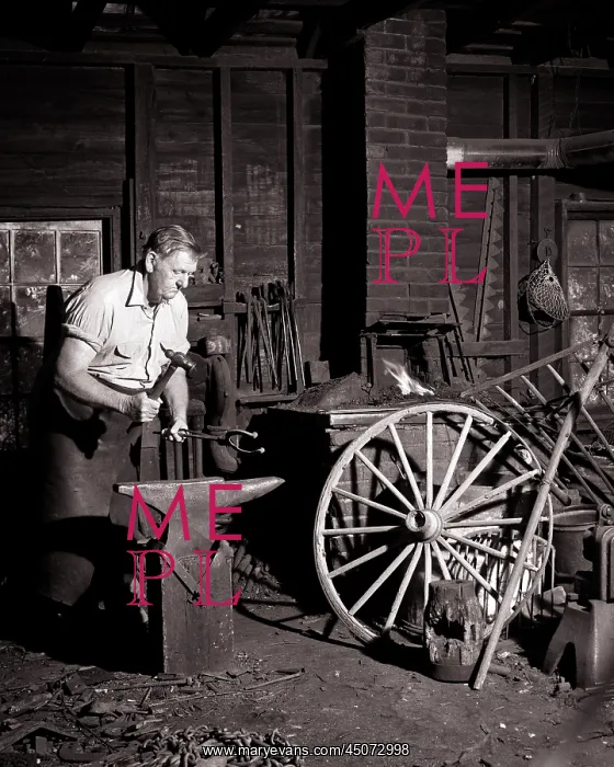 : Man Local Village Blacksmith Working As Farrier Shaping a : Man Local Village Blacksmith Working As Farrier Shaping a