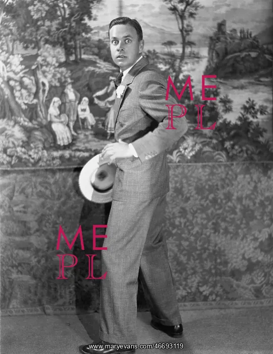 : Man looking afraid, tapestry in background : Man looking afraid, tapestry in background