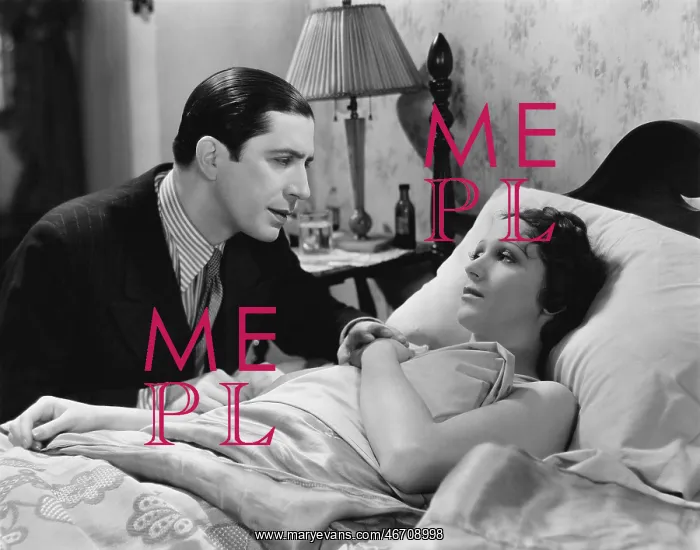 : Man looking after sick woman in bed : Man looking after sick woman in bed