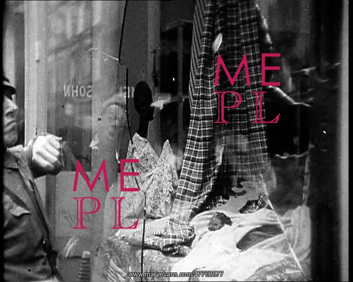 : Man Looking at a Smashed Shot Window : Man Looking at a Smashed Shot Window