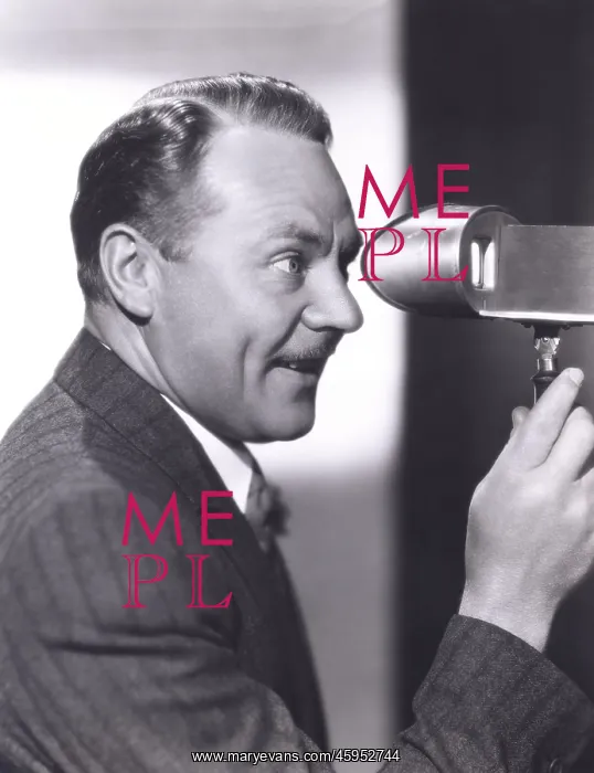 : Man looking through a viewfinder : Man looking through a viewfinder