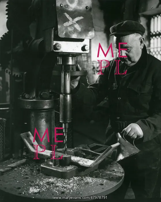 : Man in machine shop, Dinorwig Slate Quarry, North Wales : Man in machine shop, Dinorwig Slate Quarry, North Wales