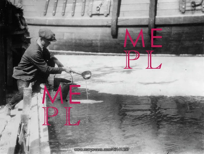 : A man makes ice by paraffin for a : A man makes ice by paraffin for a