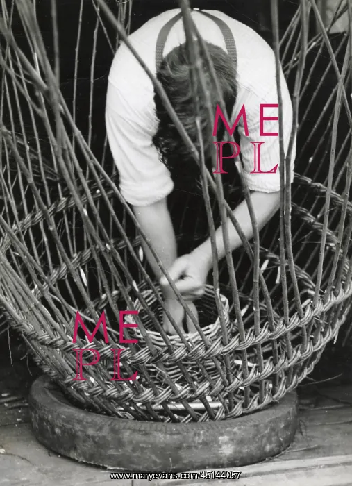 : Man making lobster pot at Beesands, Start Bay, Devon : Man making lobster pot at Beesands, Start Bay, Devon
