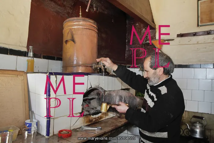: Man making mint tea, Tetouan, Morocco : Man making mint tea, Tetouan, Morocco