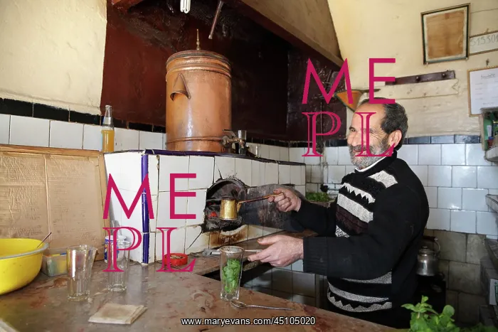 : Man making mint tea, Tetouan, Morocco : Man making mint tea, Tetouan, Morocco