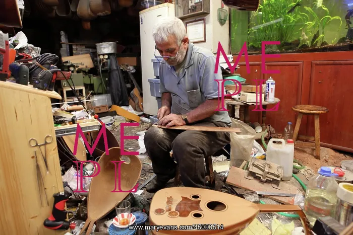 : Man making musical instruments, Bursa, Turkey : Man making musical instruments, Bursa, Turkey