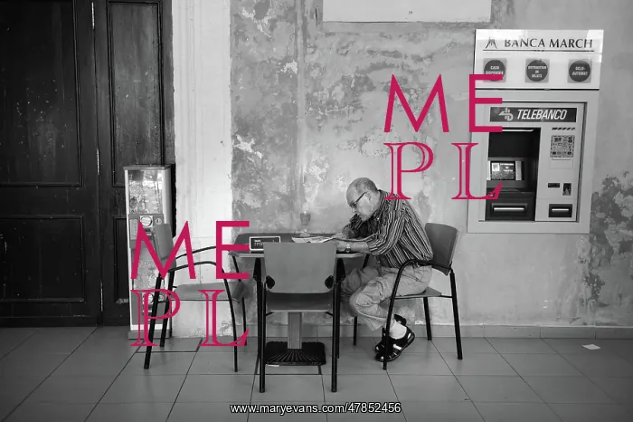 : Man in market cafe Mahon, Menorca, Spain : Man in market cafe Mahon, Menorca, Spain
