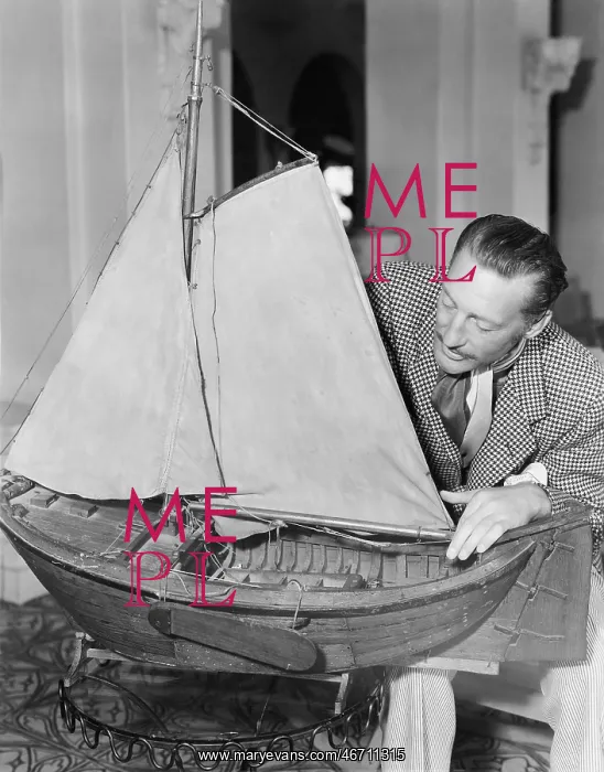 : Man with model ship : Man with model ship