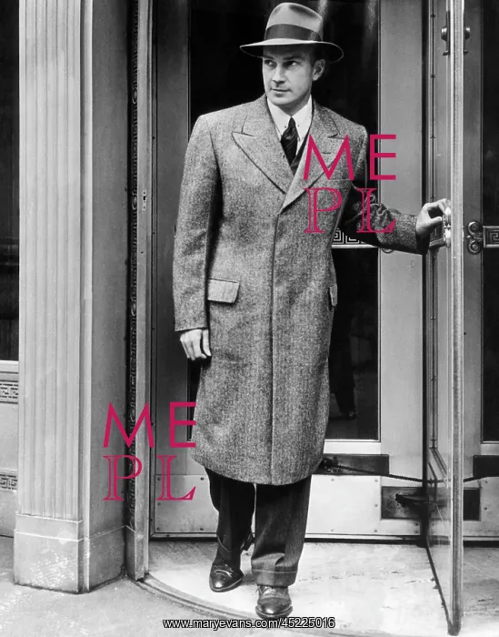 : A man models a new topcoat for spring, March, ? : A man models a new topcoat for spring, March, ?