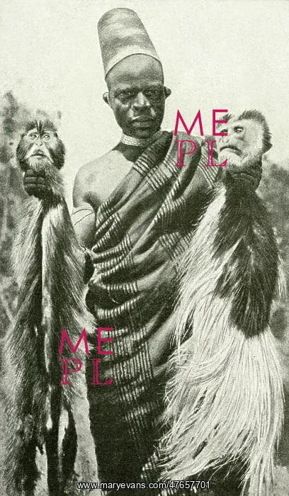 : Man with two monkey heads, East Africa : Man with two monkey heads, East Africa