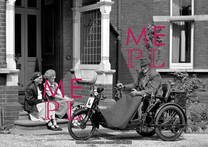 : Man in motorised bath chair : Man in motorised bath chair