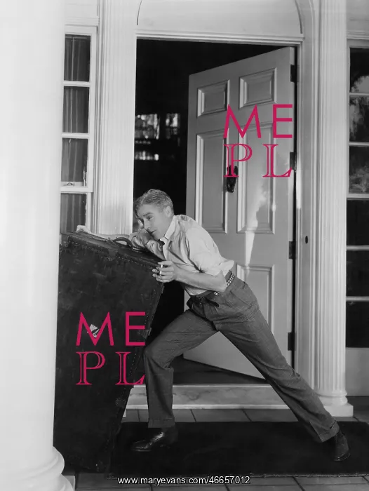 : Man moving heavy trunk : Man moving heavy trunk