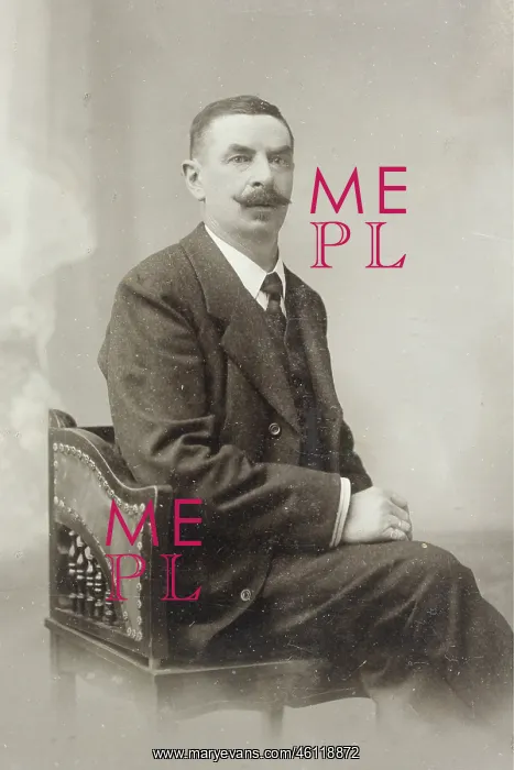 : Man with a mustache in a studio chair : Man with a mustache in a studio chair