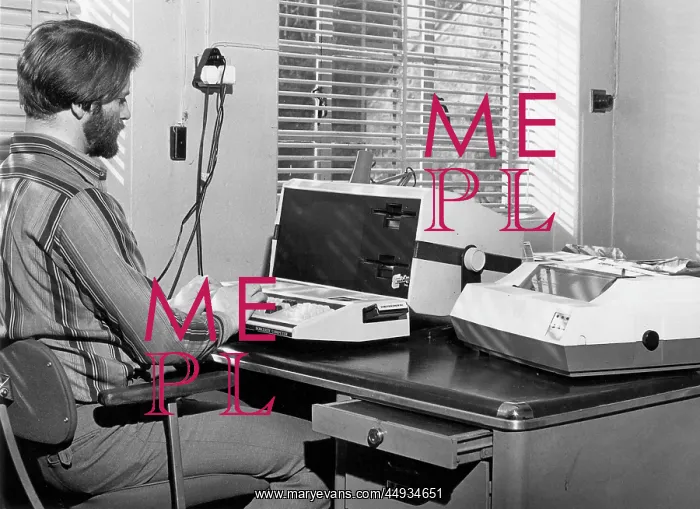 : Man in an office with an Exidy Sorcerer computer : Man in an office with an Exidy Sorcerer computer