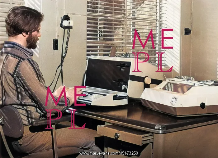 : Man in an office with an Exidy Sorcerer computer : Man in an office with an Exidy Sorcerer computer