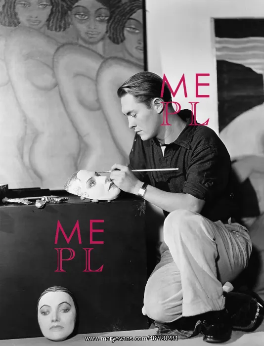 : Man painting masks : Man painting masks