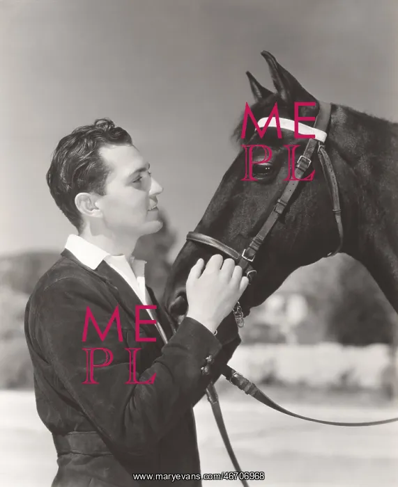  : A man petting his horse