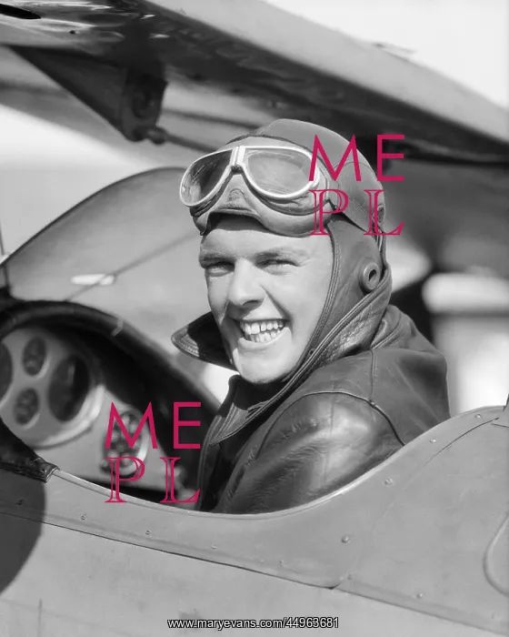 : Man Pilot Sitting in Open Air Cockpit Smiling : Man Pilot Sitting in Open Air Cockpit Smiling