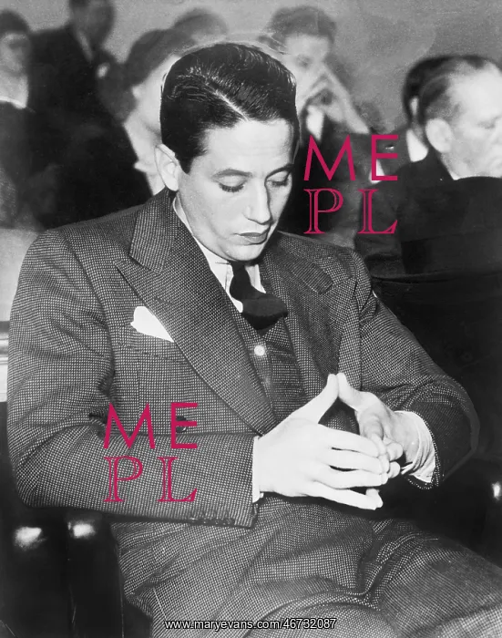 : Man playing with his fingers sitting and waiting : Man playing with his fingers sitting and waiting