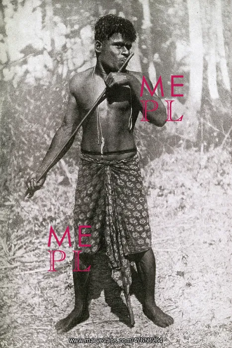 : Man playing a flute, New Caledonia, south west Pacific : Man playing a flute, New Caledonia, south west Pacific