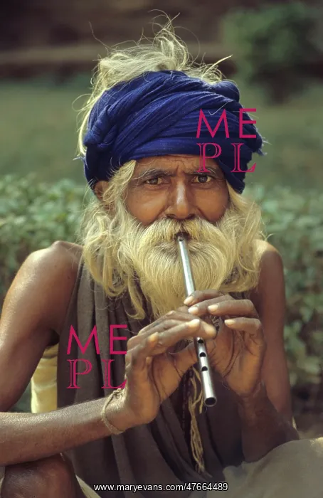 : Man playing tin whistle, Agra, India - 1 : Man playing tin whistle, Agra, India - 1