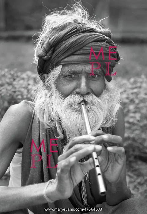 : Man playing tin whistle, Agra, India - 2 : Man playing tin whistle, Agra, India - 2