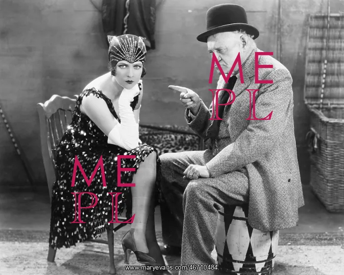  : Man pointing angrily at a young woman