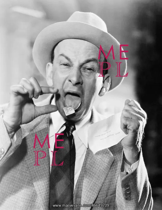: Man with a postage stamp stuck on his tongue : Man with a postage stamp stuck on his tongue