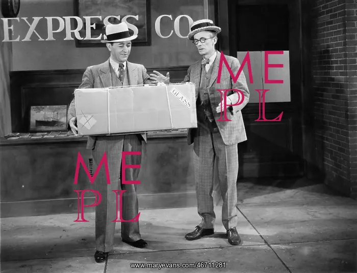 : Man posting parcel guaranteed overnight delivery : Man posting parcel guaranteed overnight delivery