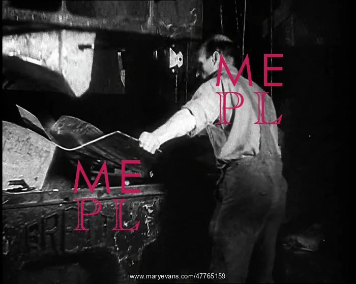 : A Man Pressing Metal : A Man Pressing Metal