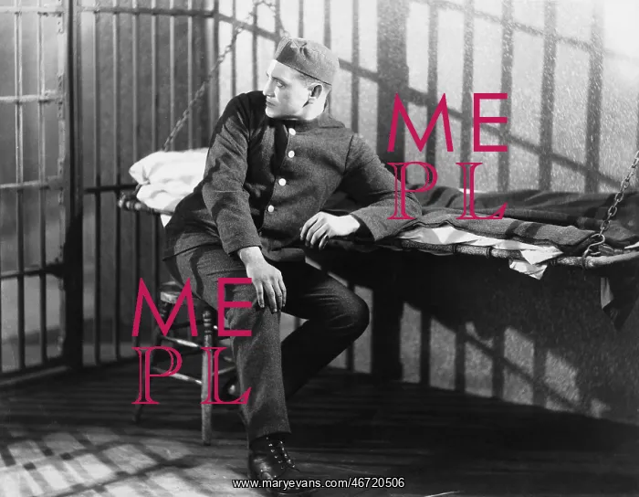 : Man in prison cell : Man in prison cell