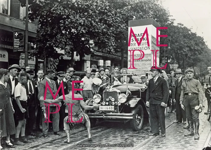 : Man pulling a car with his teeth : Man pulling a car with his teeth