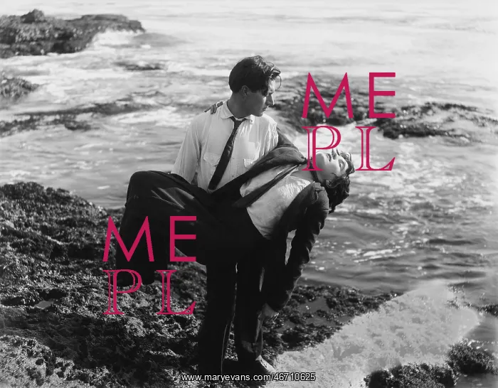 : Man pulling a dead man out of the ocean : Man pulling a dead man out of the ocean
