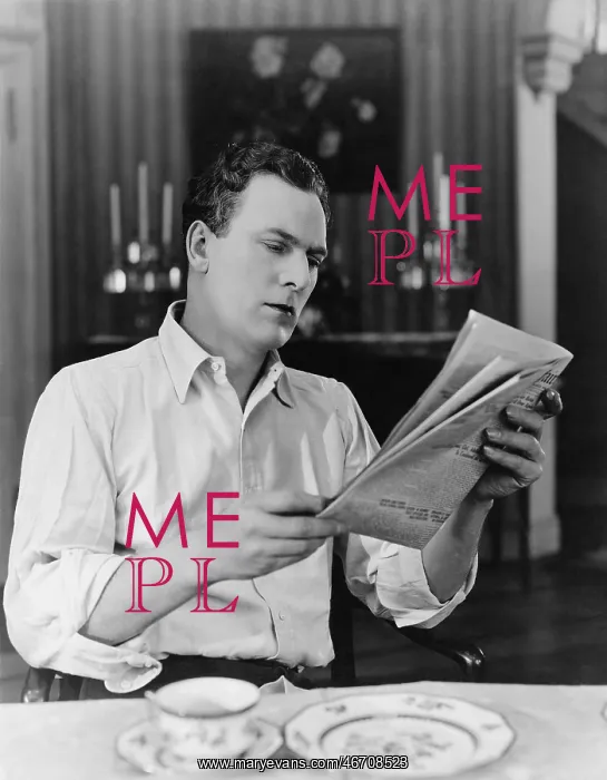 : Man reading the newspaper : Man reading the newspaper