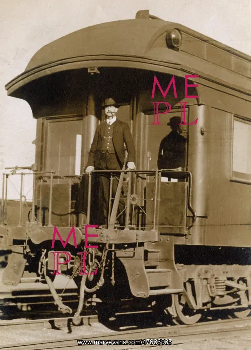 : Man at the rear of a railway train, USA : Man at the rear of a railway train, USA