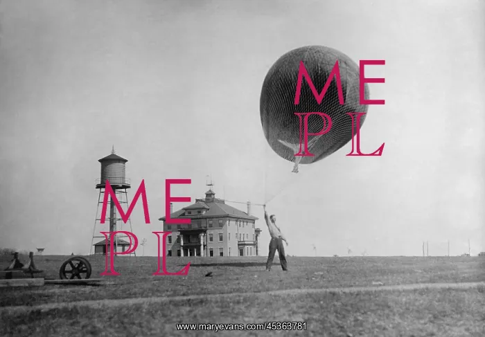: Man about to release a Weather Bureau balloon, c : Man about to release a Weather Bureau balloon, c