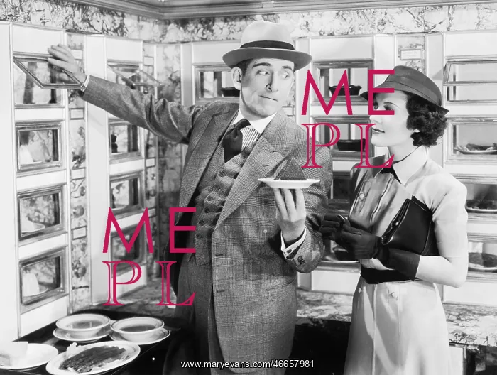 : Man serving a dish to a woman in a Automat : Man serving a dish to a woman in a Automat