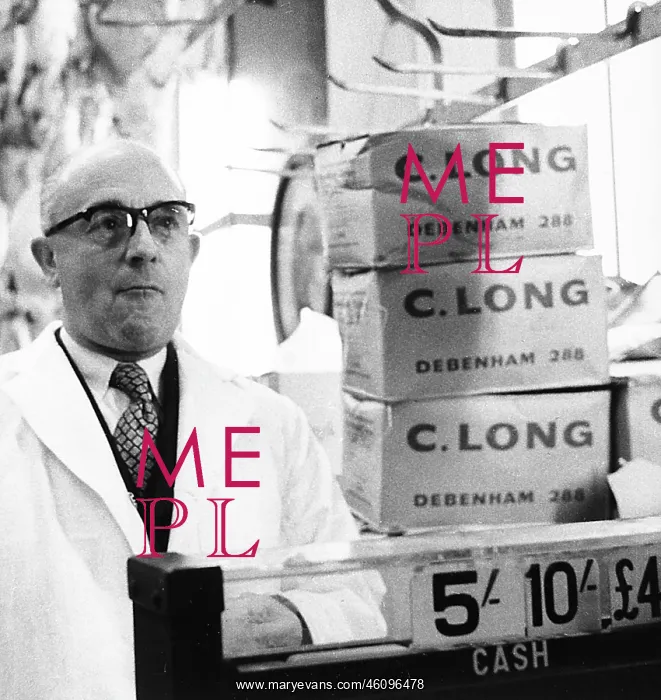 : Man serving on market stall, London : Man serving on market stall, London