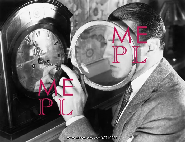  : Man setting a clock