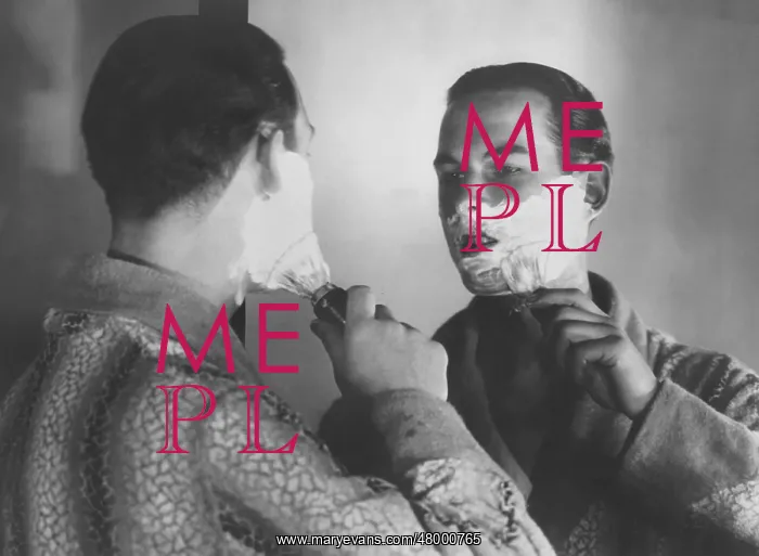 : Man shaving in front of a mirror : Man shaving in front of a mirror