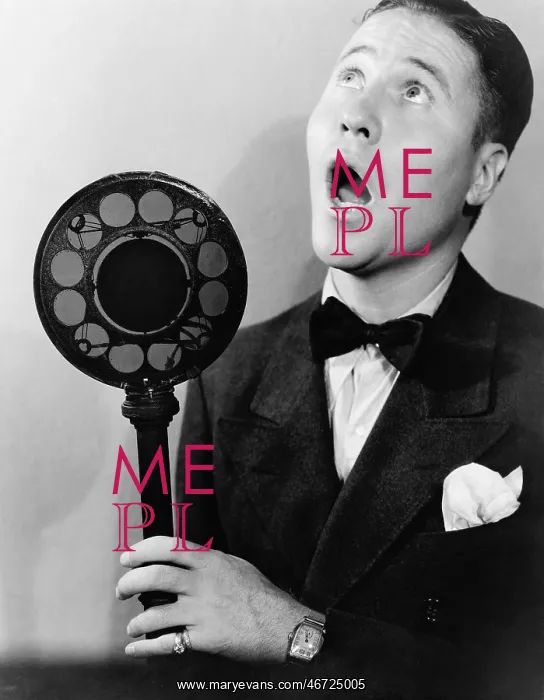 : Man singing with radio microphone : Man singing with radio microphone