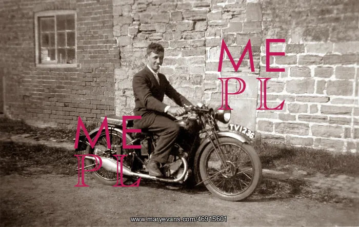 : Man sitting on 1929 / 30 BSA motorcycle : Man sitting on 1929 / 30 BSA motorcycle