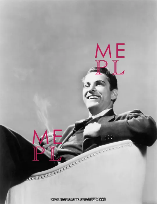 : Man sitting in an arm chair smoking : Man sitting in an arm chair smoking