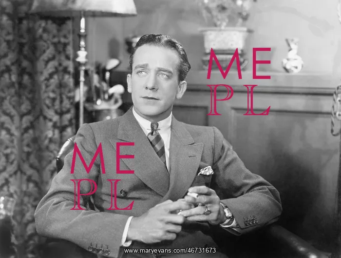  : Man sitting and holding a cigarette
