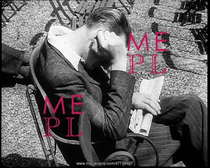 : Man Sleeping on a Chair While Clutching a Newspaper : Man Sleeping on a Chair While Clutching a Newspaper