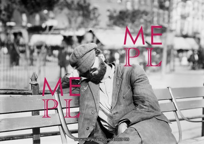 : Man sleeping with his hat over eyes, on a : Man sleeping with his hat over eyes, on a