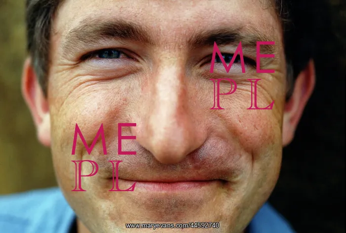 : Man smiling close up and directly into the camera : Man smiling close up and directly into the camera